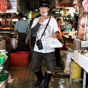 Man carrying plastic bag