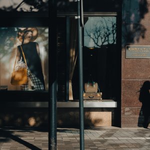 Woman in a corner of a street of Marunouchi