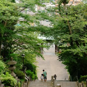 Girl and father on stairway