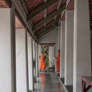 Monks at end of corridor