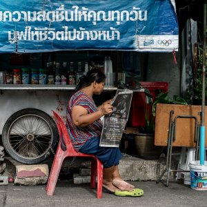 Women reading newspaper