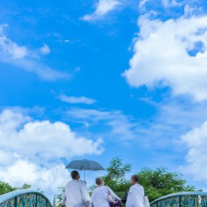 Three nuns on bridge