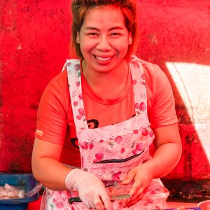 Woman with gloves on only one hand