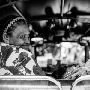 Older woman smiling in Tuktuk