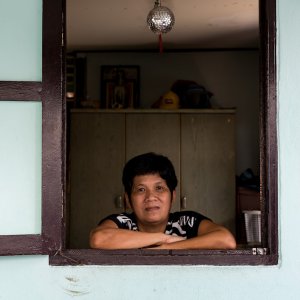 Woman standing at window