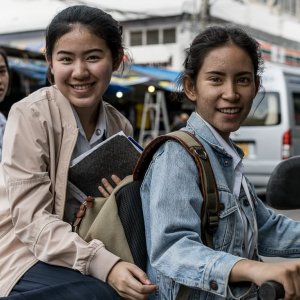 Three school girls in Mae Klong
