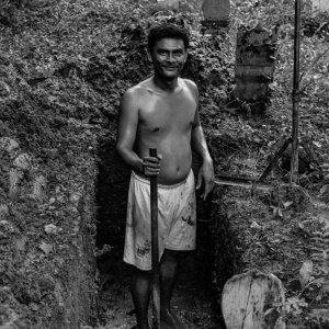 Man digging grave