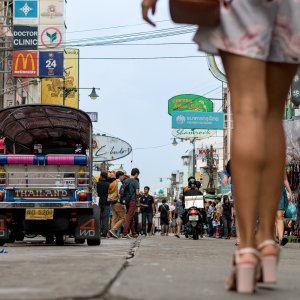 Slender legs walking through Khaosan Road