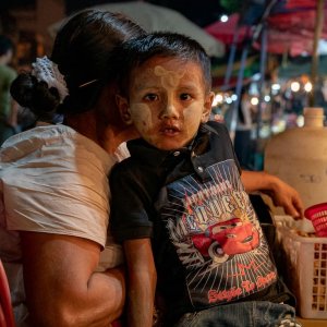 Boy painted Thanaka on face