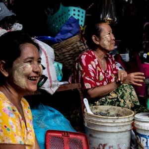 Smiling women in market
