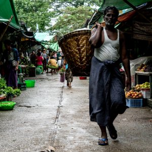 Man carrying a big basket