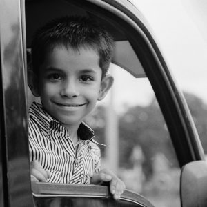 Boy smiling in car