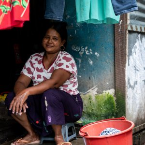 Woman washing laundriesl