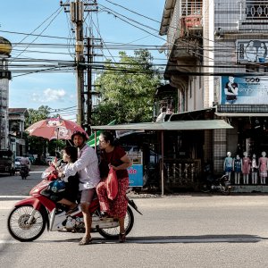 Family riding on same motorbike