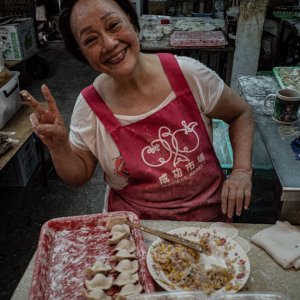 Woman making Jaozi in market
