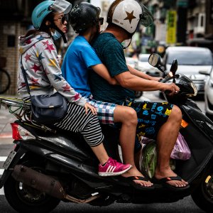 Family on one scooter
