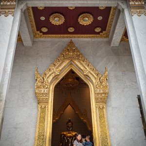 Woman coming out of Wat Trimit