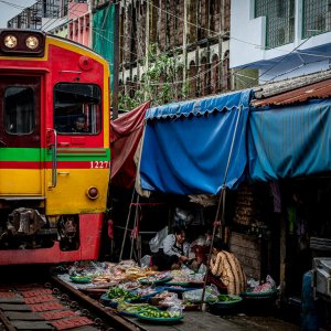 Train coming into Mae klong Railway Market