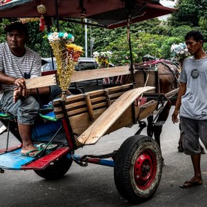 Coachmen waited for customers near Fatahillah Square in Jakarta