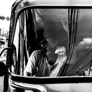 Bajaj parked by the roadside in Glodok, Jakarta