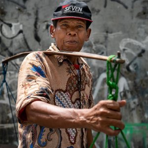 Hawker carrying a yoke