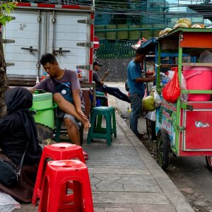 People preparing to open a food stall in Jakarta