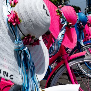 Rental bikes and colorful hats