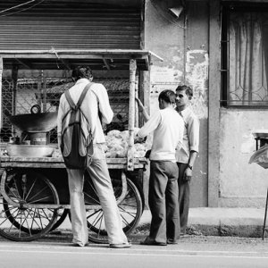 Tall man in food stall