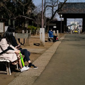 People relaxing in the precincts of Kita-in Temple