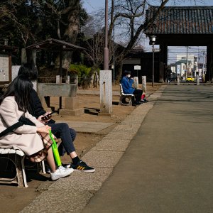People relaxing in the precincts of Kita-in Temple