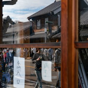 Old townscape of Kawagoe reflected in the glass door