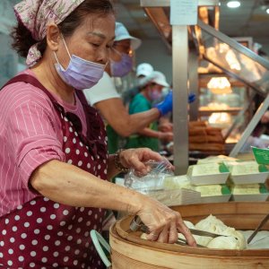 Woman grabbing Tangbao