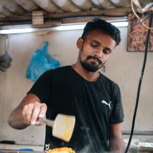 Man baking dosa