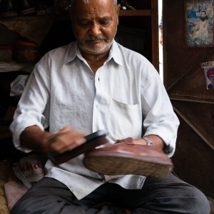 Man polishing his shoe