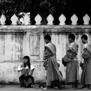 Buddhist monks waiting for their turn