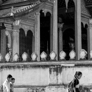 kids walking in front of temple