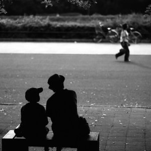 Silhouettes sitting together
