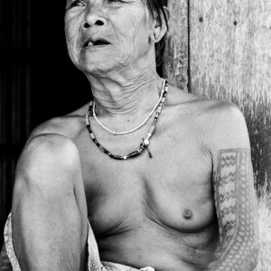 Older woman with tattoo