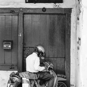 Motorbike below name tablet