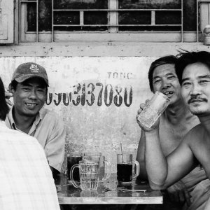 Men drinking in eating place