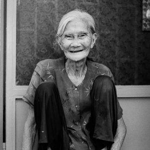 wrinkled smile of an older woman