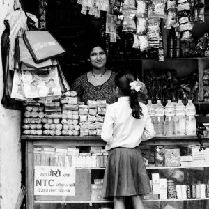 Female storekeeper in general store