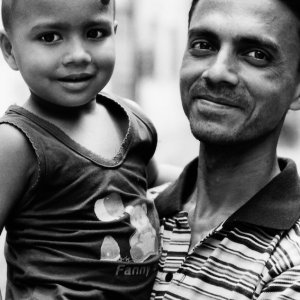 Father and son smiling