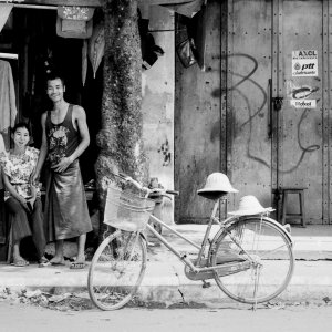 Man, woman and bicycle