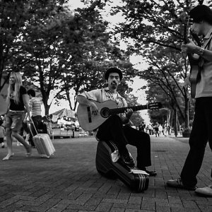 Two guitarists in street