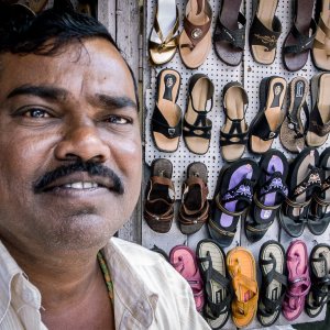 Man working in shoe shop