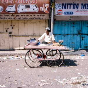 Man sitting on wagon
