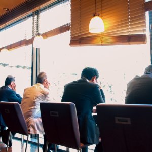 Businessmen in a cafe