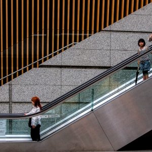 Women on escalator