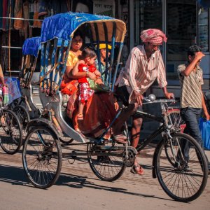 Mother and baby on cycle rickshaw